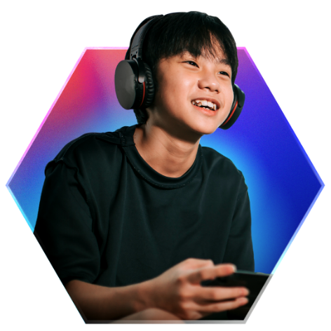 Boy with headphones gaming