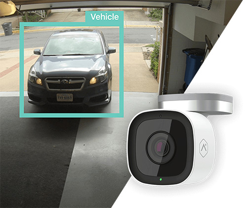Garage security camera identifying a vehicle with smart detection box, alongside Blue Ridge outdoor security camera device.